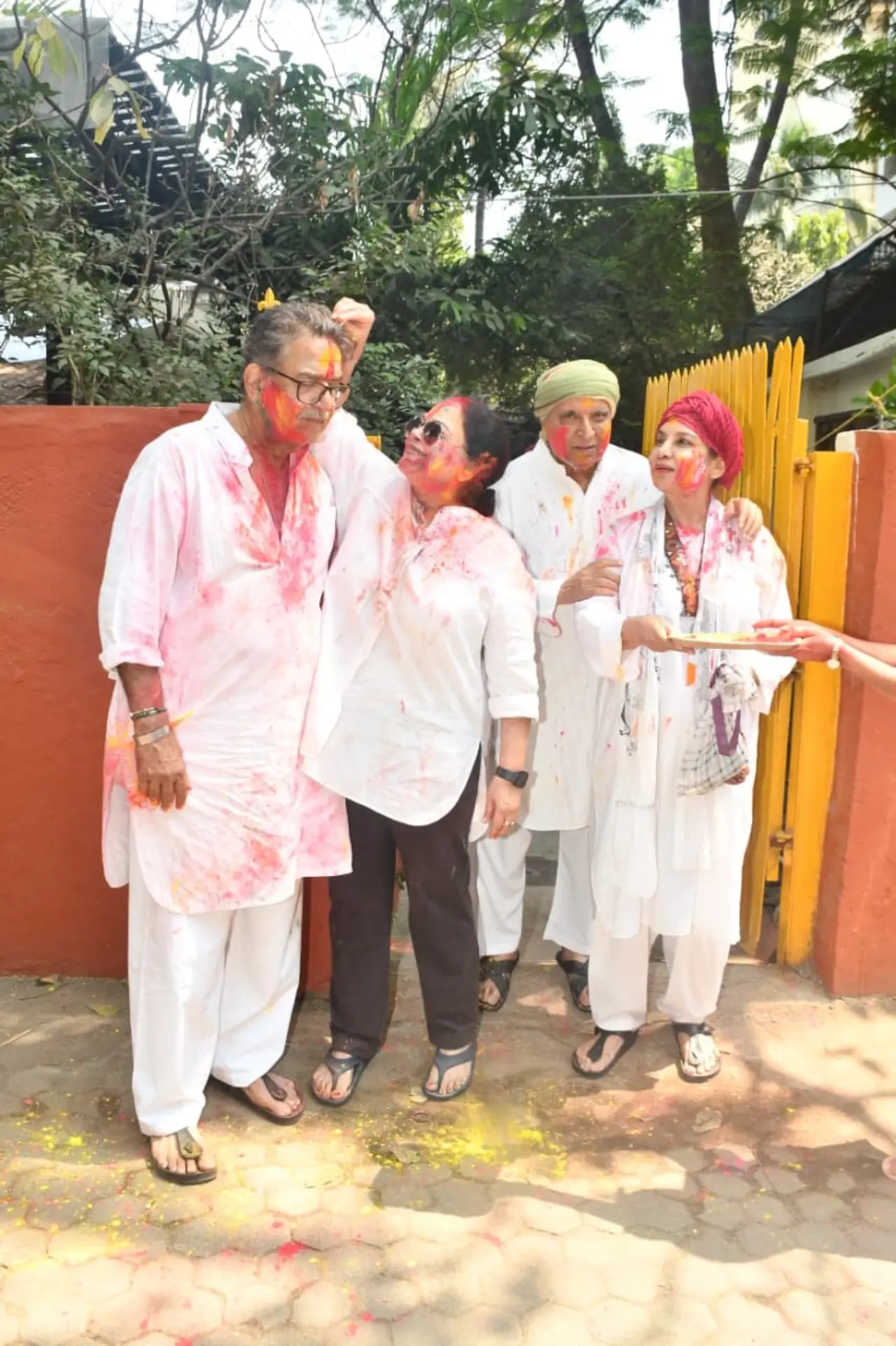 Shabana Azmi looked in a playful mood as she hosted a vibrant Holi bash with husband Javed Akhtar. The couple was seen laughing, greeting guests with warm hugs, and soaking in the festive spirit with colours and music.